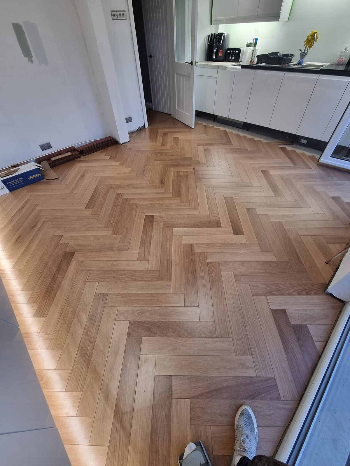 Modern kitchen with herringbone floor